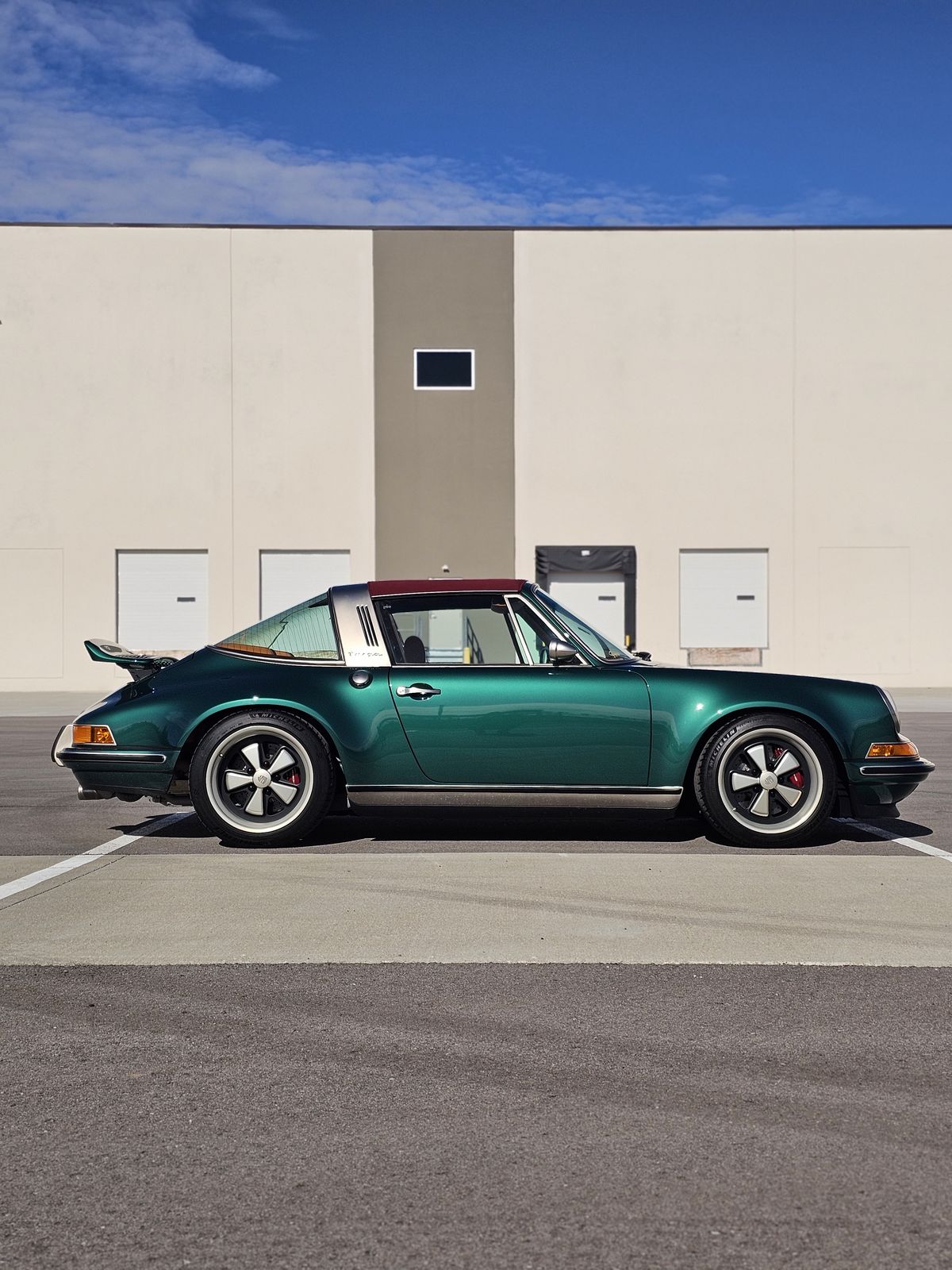 Green restomod Porsche 911 Targa