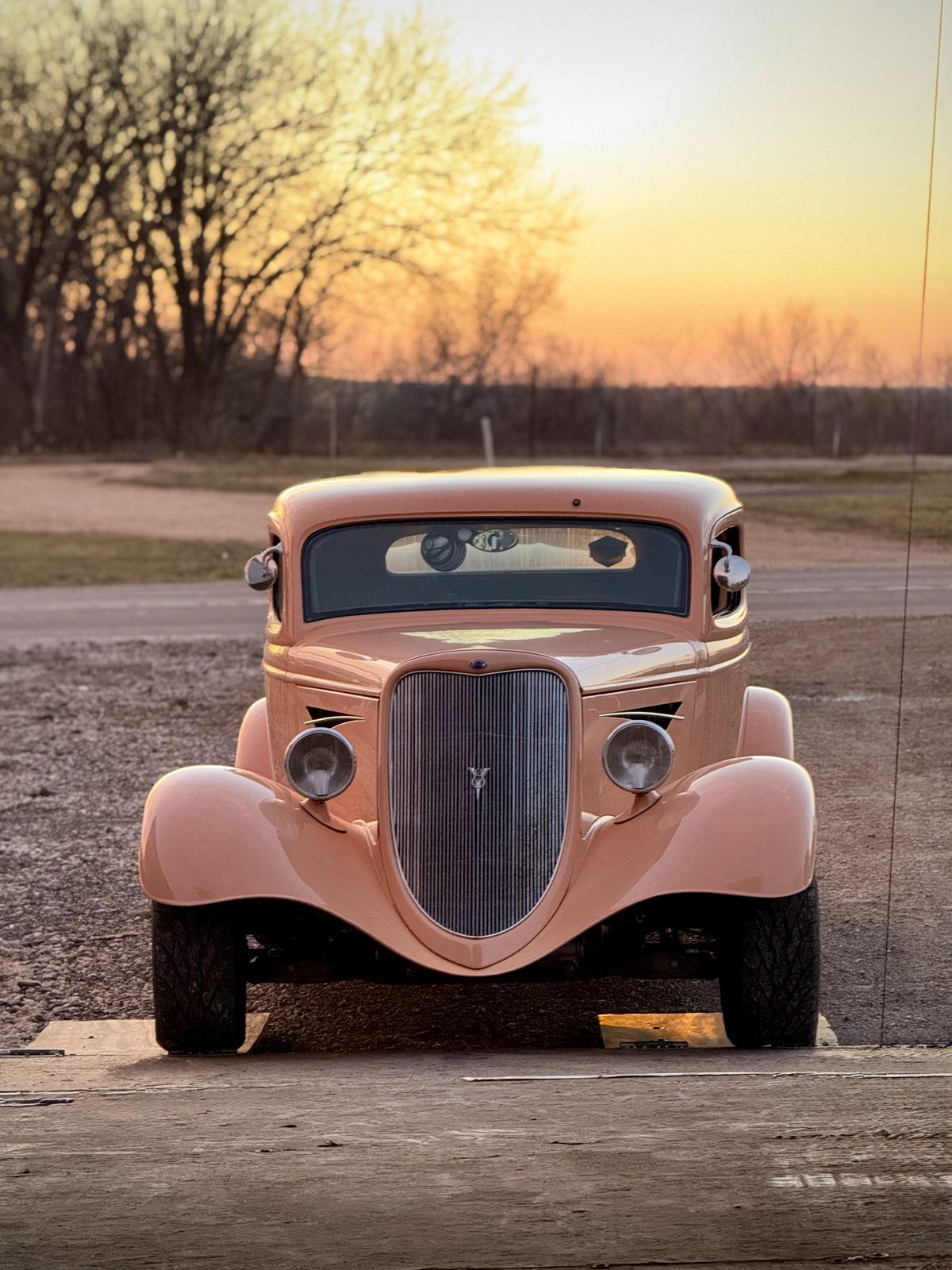 1934 Ford hot rod at sunset